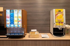 A vending machine with a colorful display and a soup dispenser. - Washington R&B Hotel Sendai Higashiguchi (Sendai)