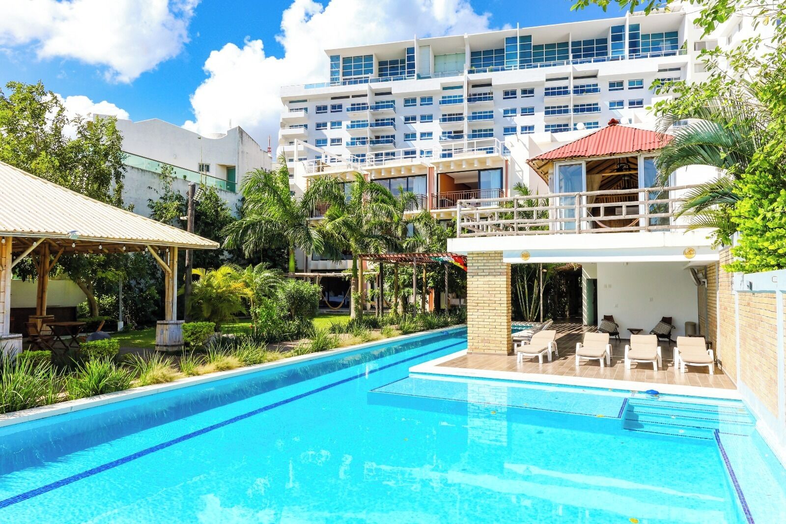 Outdoor pool, pool umbrellas, pool loungers