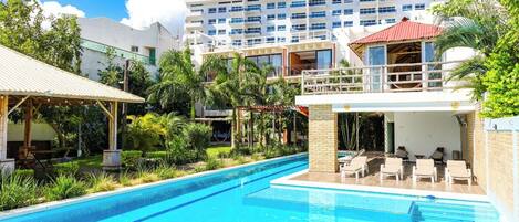 Outdoor pool, pool umbrellas, pool loungers