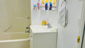 Hair dryer, towels, soap, shampoo