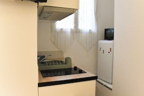 Een magnetron, een oven, een kookplaat