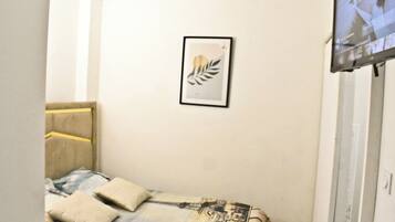 1 chambre, fer et planche Ă  repasser, Wi-Fi, draps fournis