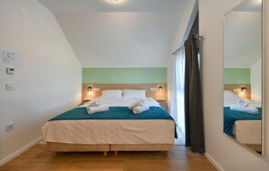 2 bedrooms, in-room safe, iron/ironing board, travel crib