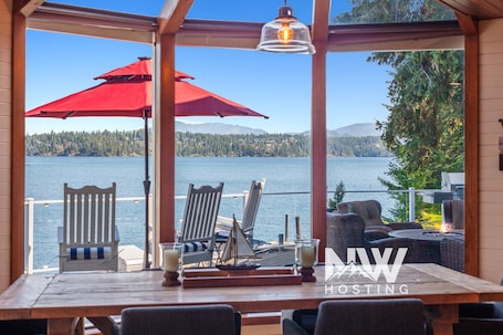 Outdoor dining. Luxury Lakefront Property—Private Dock, Boat Slip, Fire Table, Hot Tub, Paddle Boards & More!