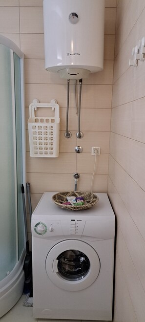 Hair dryer, towels, soap, toilet paper
