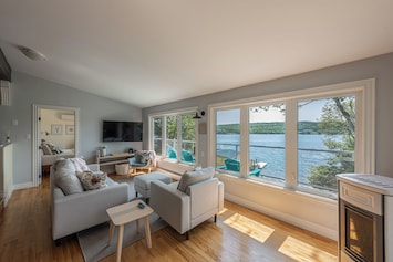 Living Area with Expansive Views of Prospect Bay + 55' Smart TV