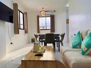 Habitación doble ejecutiva | Área de sala de estar