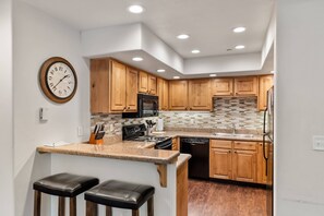 Fridge, microwave, oven, stovetop - Walk to Ski/Shuttle to Base/Town+Heated Pool-Hot Tub-Gym-Elevator-W/D-Private Balcony w/View & Grill (Steamboat Springs)