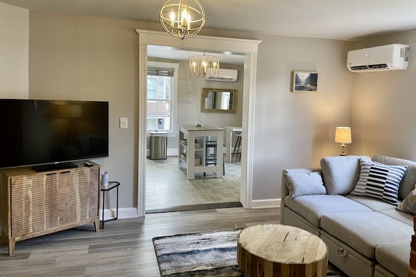 The family room is centrally located in the unit.