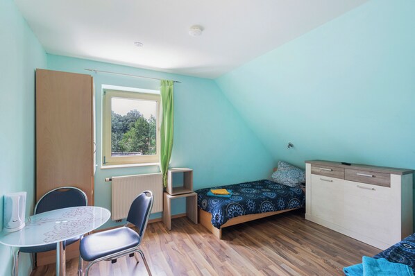 1 غرفة نوم ومكواة/لوح كي وواي فاي مجانًا وملاءات أسرّة