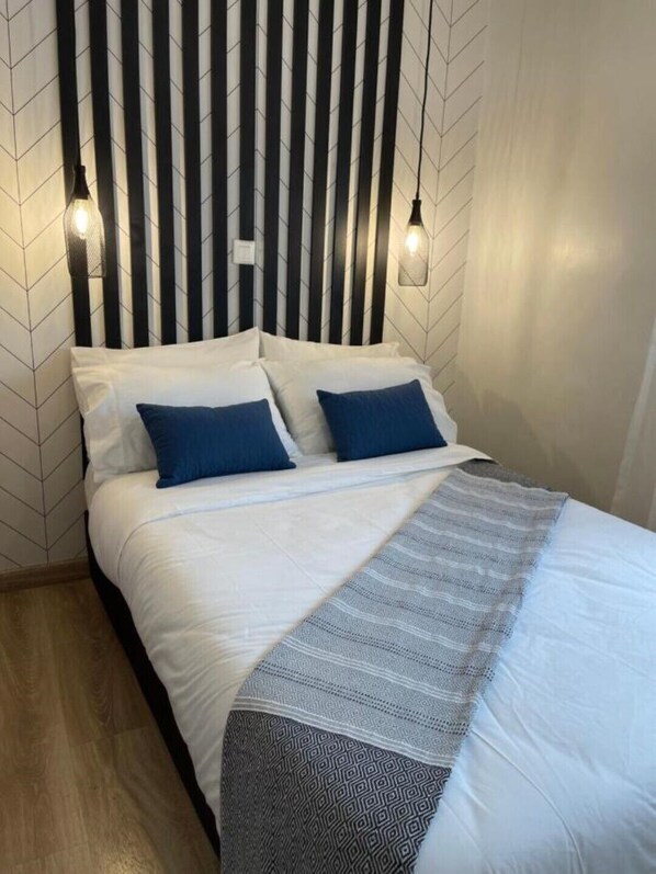 1 slaapkamer, een strijkplank/strijkijzer, wifi, beddengoed