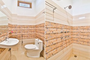 Deluxe-Zimmer | Badezimmer | Dusche, Regendusche, kostenlose Toilettenartikel, Handtücher