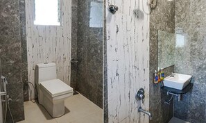 Camera Deluxe | Bagno | Doccia, soffione a pioggia, set di cortesia gratuito, asciugamani