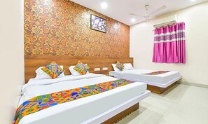 Family Room | Egyptian cotton sheets, premium bedding, in-room safe, free WiFi - Fabhotel Raghumani Palace (Ujjain)
