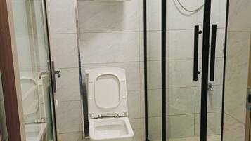 Superior Apartment, City View | Bathroom | Shower, slippers, towels, soap