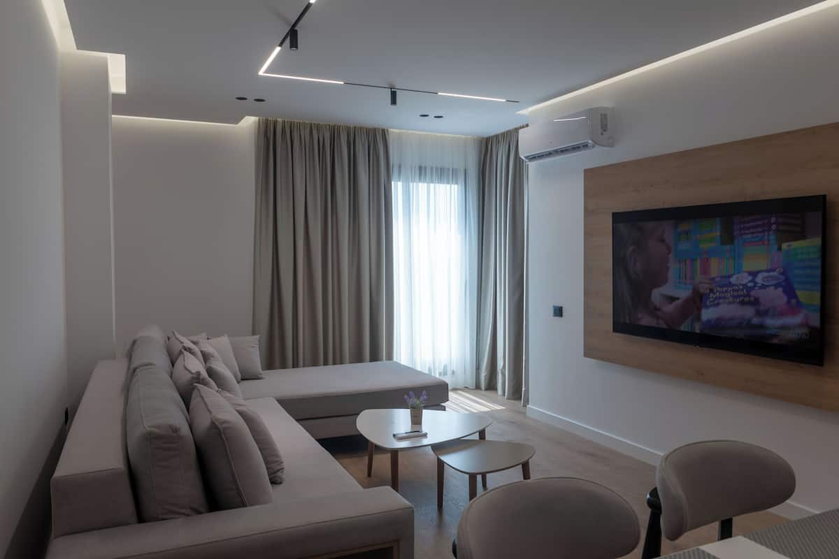 Apartment, Sea View | Living area | TV