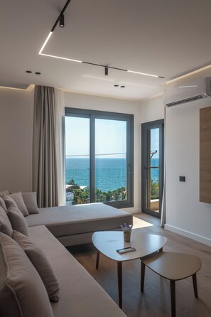 Appartement, vue mer | Coin séjour | Télévision