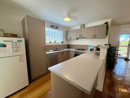 Deluxe House, Multiple Beds, Non Smoking | Private kitchen | Full-size fridge, microwave, oven, dishwasher