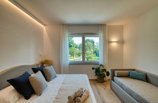 Junior Triple Room, Garden View