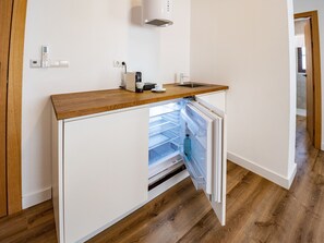 Fridge, coffee/tea maker, electric kettle, toaster