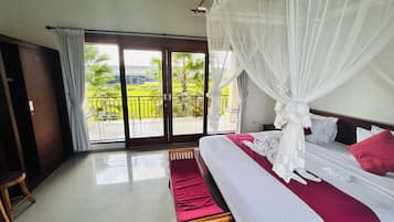 Kamar Double Deluks, pemandangan kebun | Setrika/meja setrika dan Wi-Fi gratis