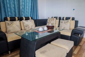 Superior bungalow, balkon, uitzicht op bergen | Woonruimte