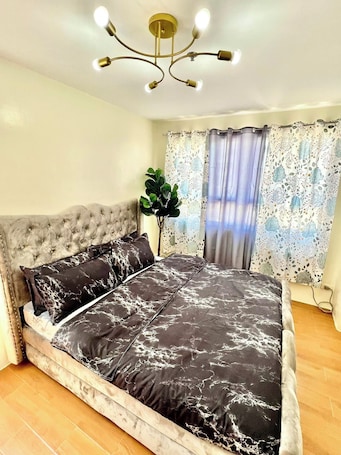 2 habitaciones y wifi gratis . Seawind Condo 2 BR Free Wifi Near Samal