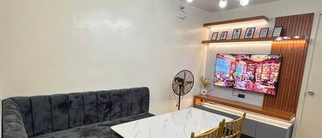 Family Condo, Balcony, Partial Sea View | Living area