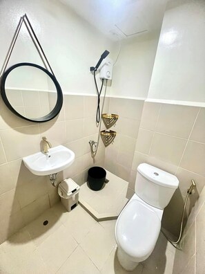 Family Condo, Balcony, Partial Sea View | Bathroom - Seawind Condo 2 BR Free Wifi Near Samal (Davao)