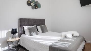 2 habitaciones, tabla de planchar con plancha, wifi y ropa de cama