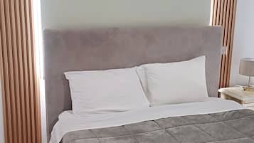 2 dormitorios, tabla de planchar con plancha, wifi gratis y ropa de cama