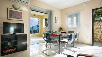 Family Villa, Balcony | Living area | Flat-screen TV