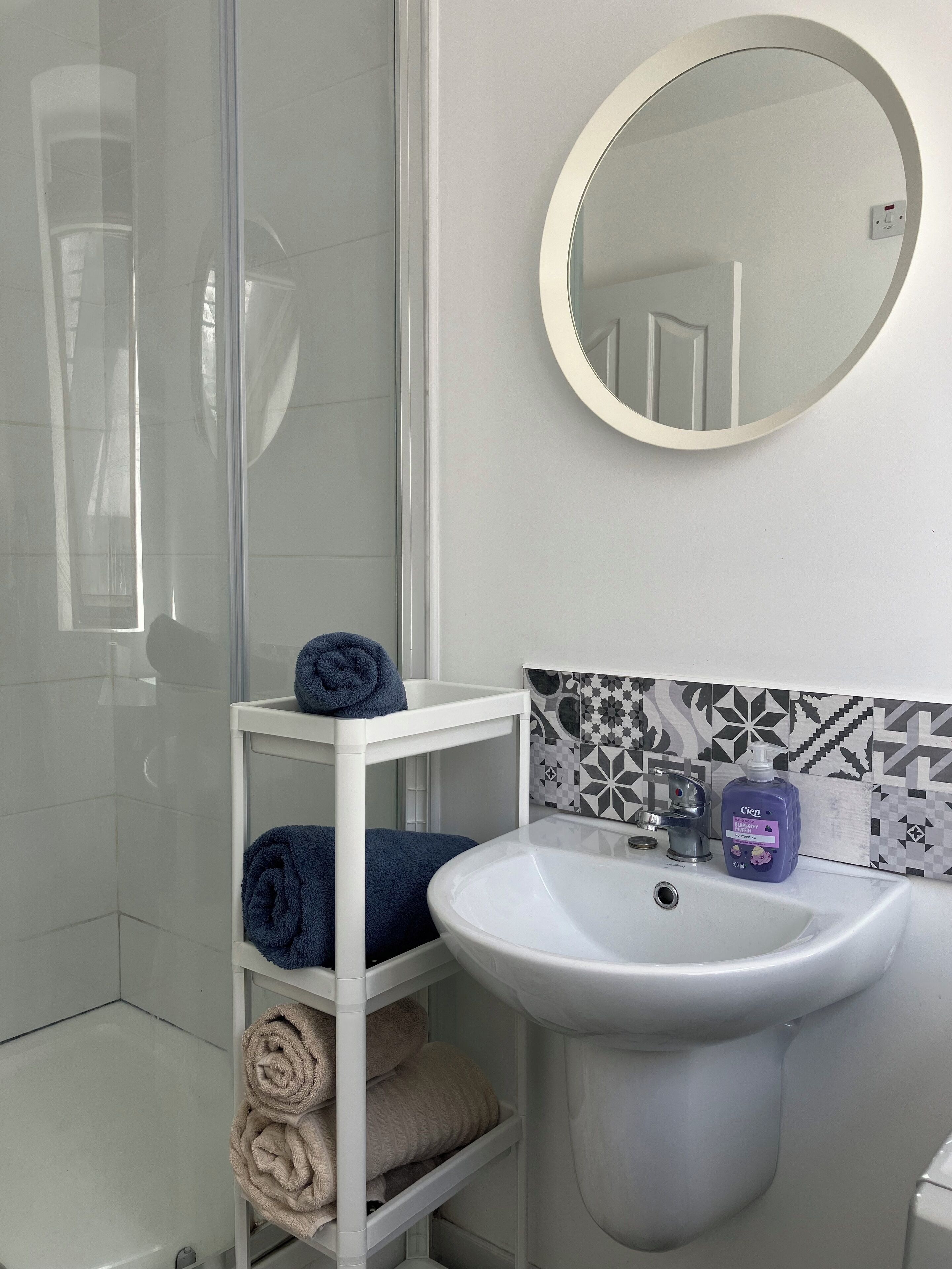 Shower, hair dryer, towels, soap