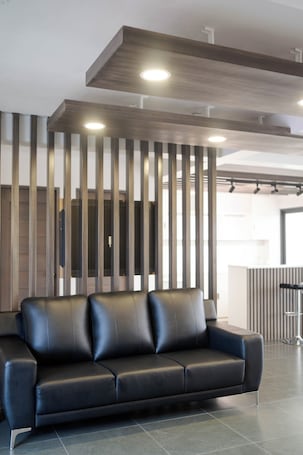 Penthouse | Living area. A Traveller's Inn