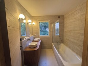 Shower, hair dryer, towels, soap