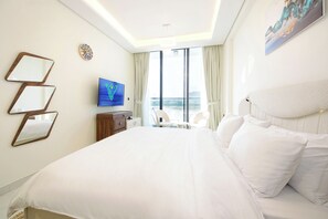 Studio, 1 King Bed, Kitchenette, Garden Area | 1 bedroom, iron/ironing board, free WiFi