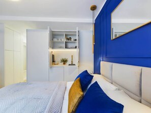 Fer et planche à repasser, lit parapluie, Wi-Fi, draps fournis