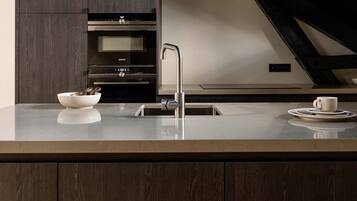 Penthouse | Private kitchen | Fridge, microwave, oven, stovetop