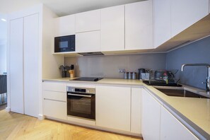 Apartment | Private kitchen | Fridge, microwave, oven, stovetop