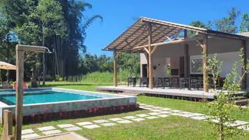 Outdoor pool, pool umbrellas, sun loungers