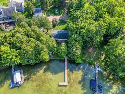 Lake Helen Waterfront Retreat with fire pit and dock