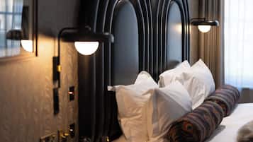 Designer toiletries, hair dryer, bathrobes, slippers