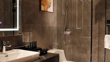 Shower, free toiletries, hair dryer, slippers