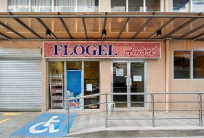 A storefront with a sign reading "FLOGEL Amore" and a wheelchair accessibility symbol. - Flogel Amore Pension House (Cebu City)