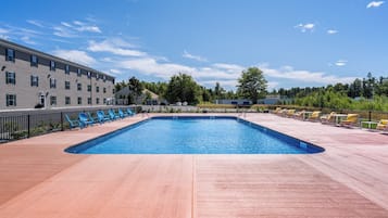 Seasonal outdoor pool, open 8:00 AM to 10:00 PM, pool umbrellas