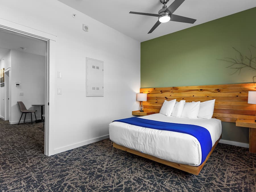 Premium bedding, down duvets, memory-foam beds, laptop workspace