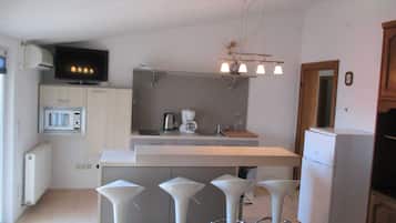 Villa (Two Bedroom Apartment with Balcony) | Private kitchen | Fridge