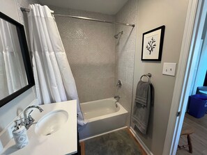 Hair dryer, towels, soap, shampoo