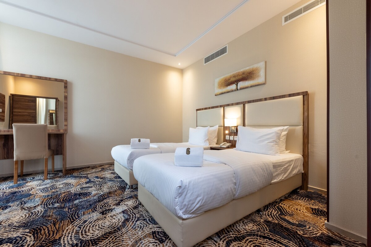 Egyptian cotton sheets, premium bedding, down duvets, in-room safe