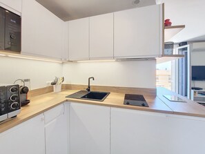 Fridge, microwave, coffee/tea maker, electric kettle